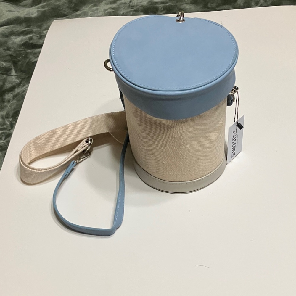 Cylindrical Blue and Cream Crossbody Bag